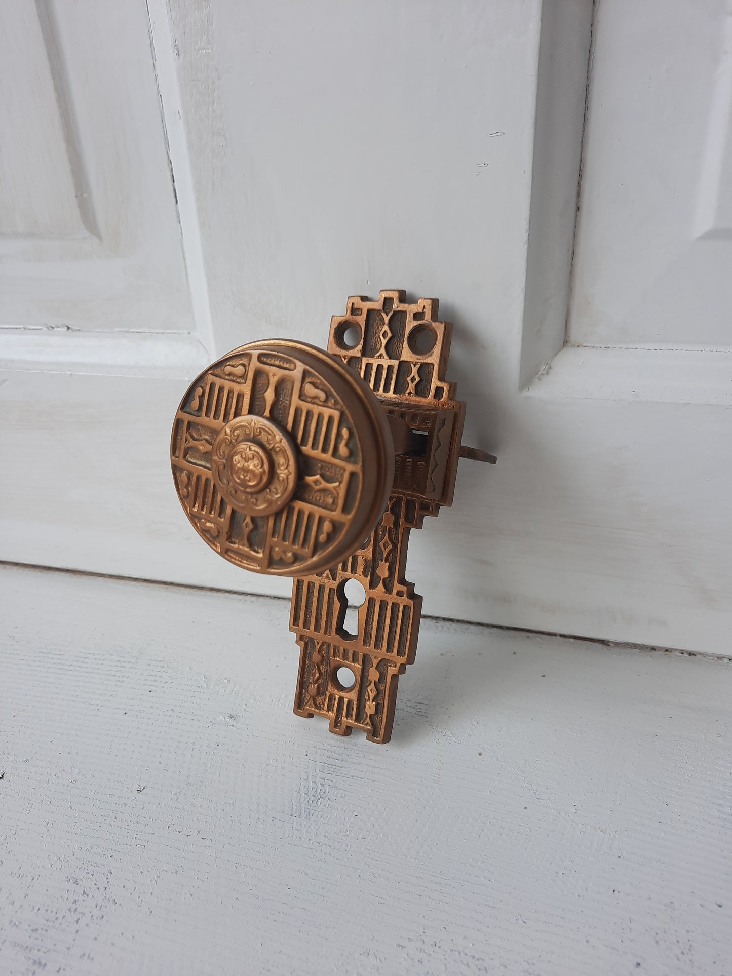 Gilbert Lock Works Antique Bronze Doorknob and Plate Combination