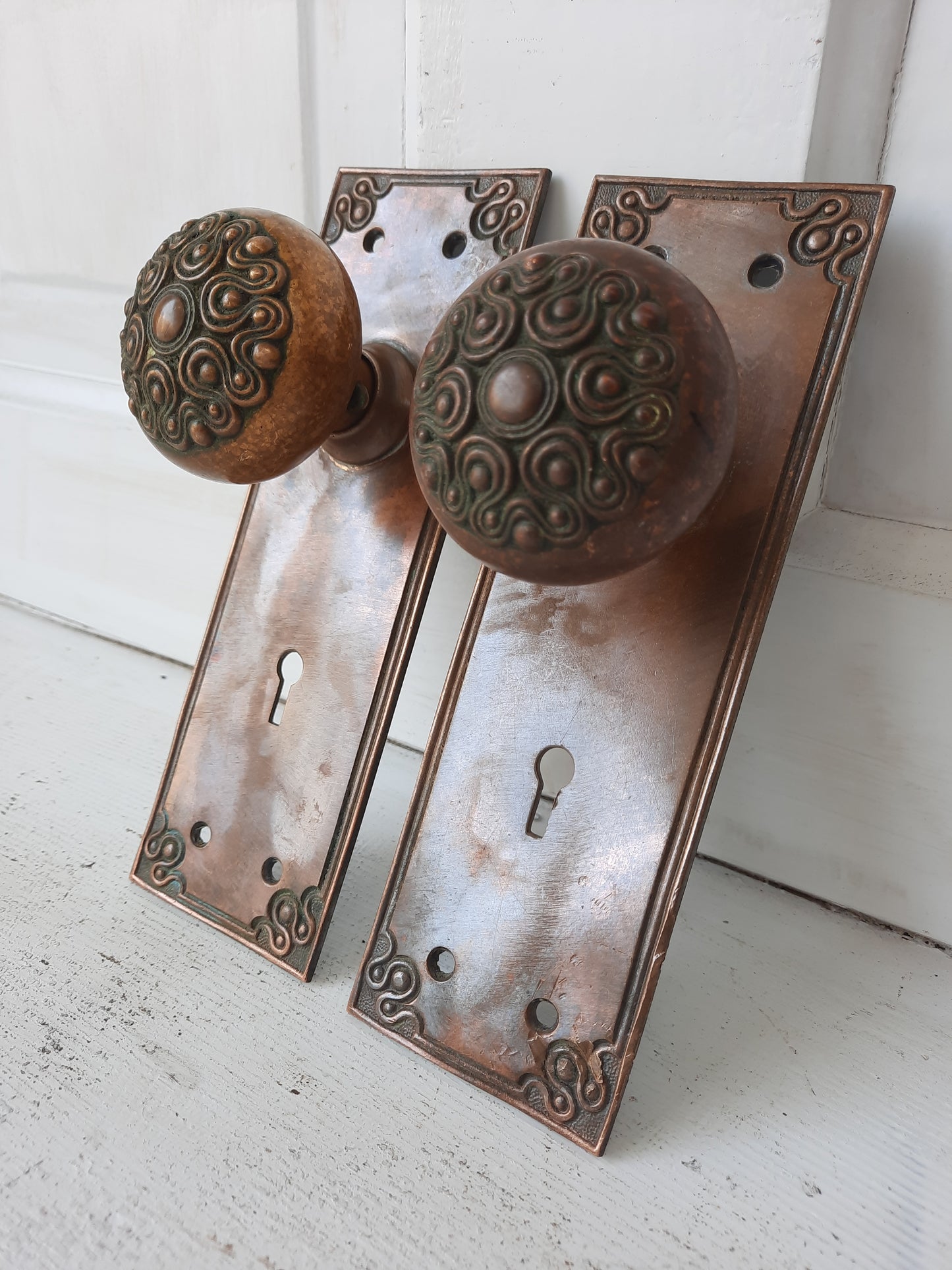 Delphi Pattern Hardware Set by Russell Erwin, Antique Swirl Design Bronze Door Knob Plate Set