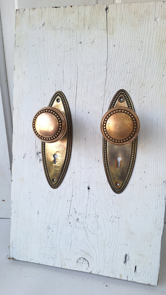 Set of Beaded Edge Doorknobs and Plates, Antique Brass Door Hardware Set