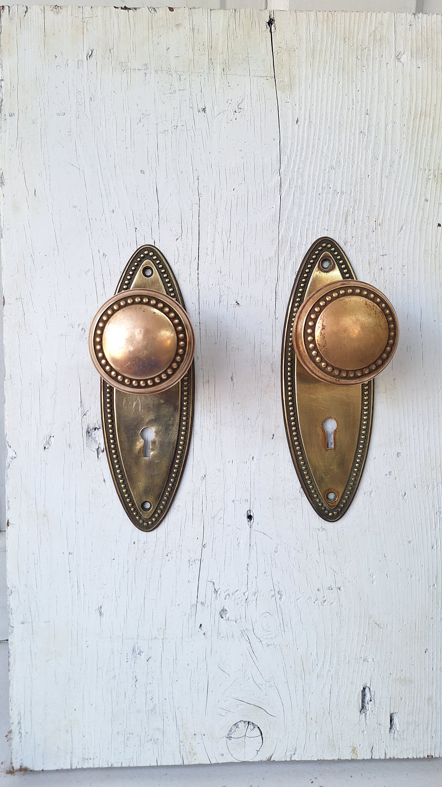 Set of Beaded Edge Doorknobs and Plates, Antique Brass Door Hardware Set