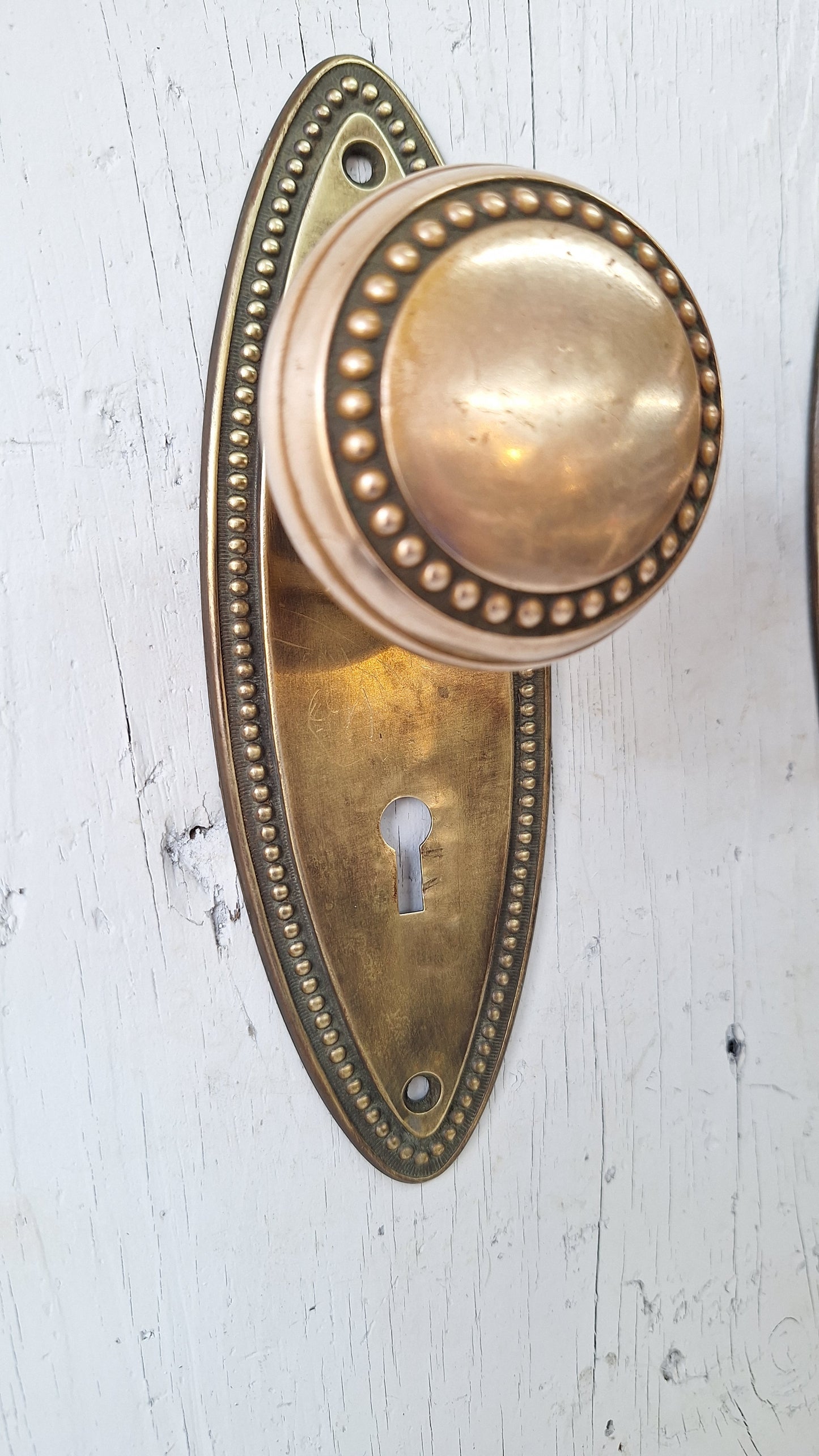 Set of Beaded Edge Doorknobs and Plates, Antique Brass Door Hardware Set