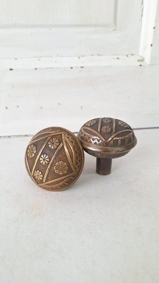 Two FC Linde Antique Bronze Doorknobs: Floral Eastlake Design