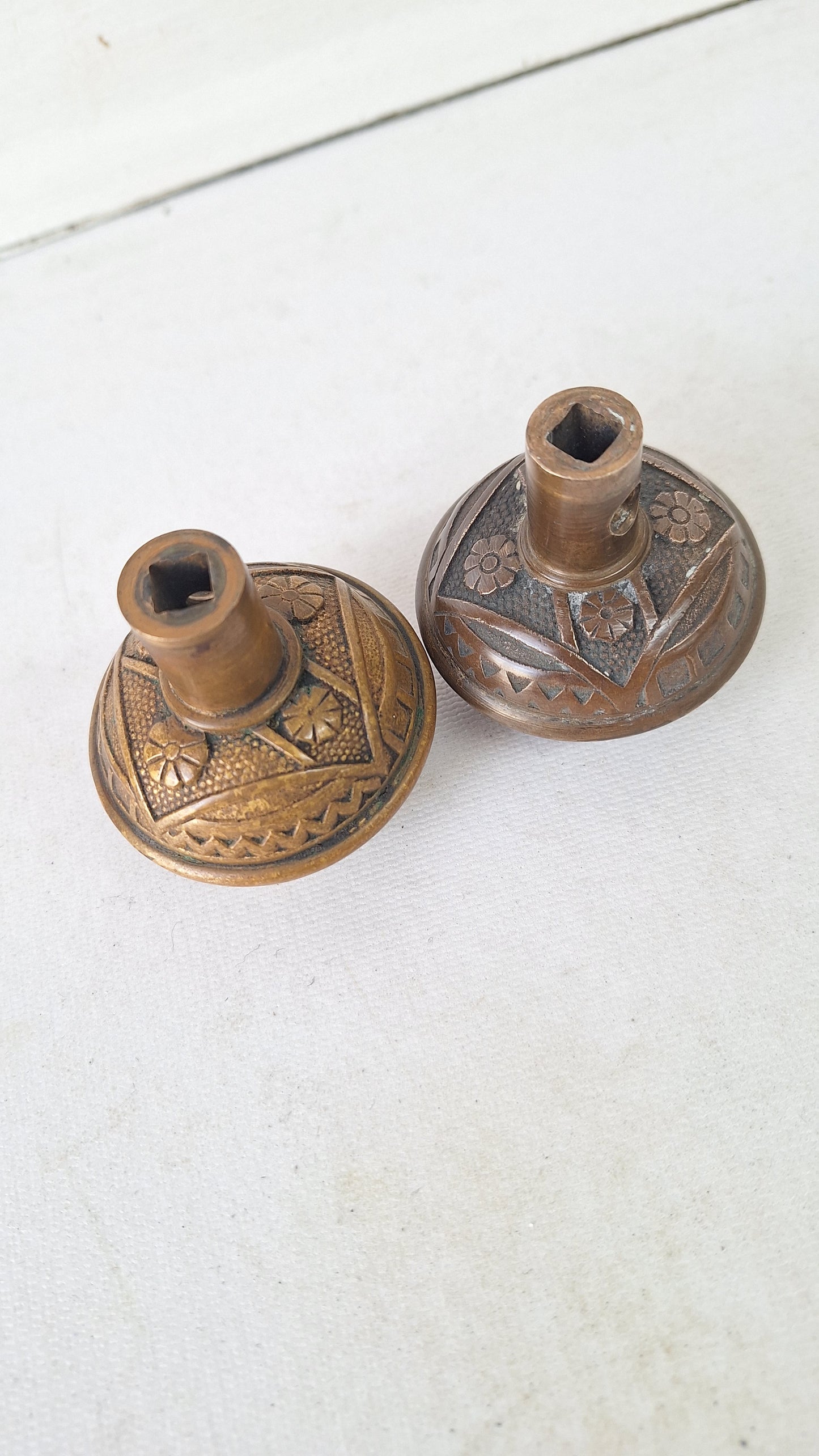 Two FC Linde Antique Bronze Doorknobs: Floral Eastlake Design