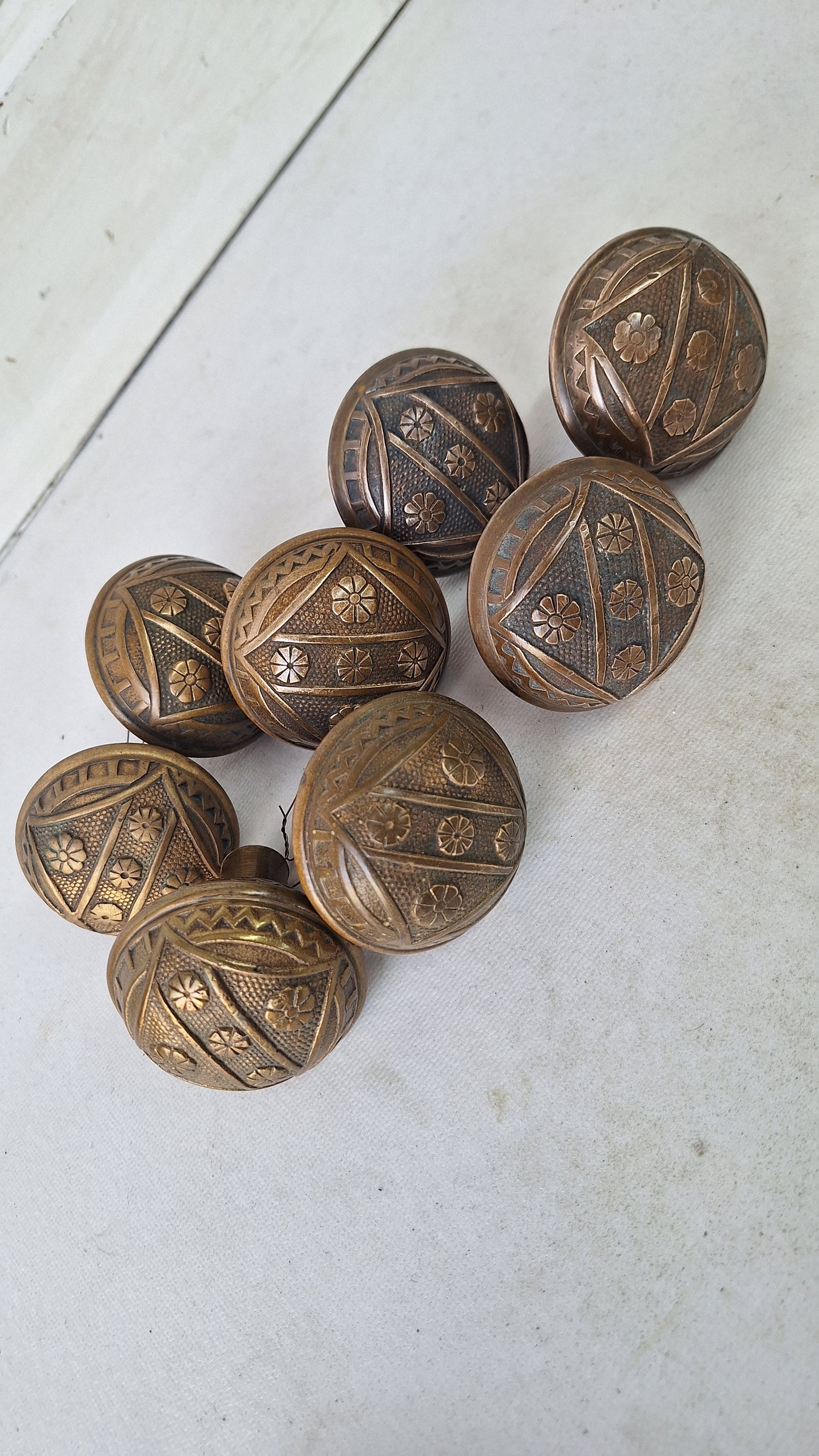 Two FC Linde Antique Bronze Doorknobs: Floral Eastlake Design