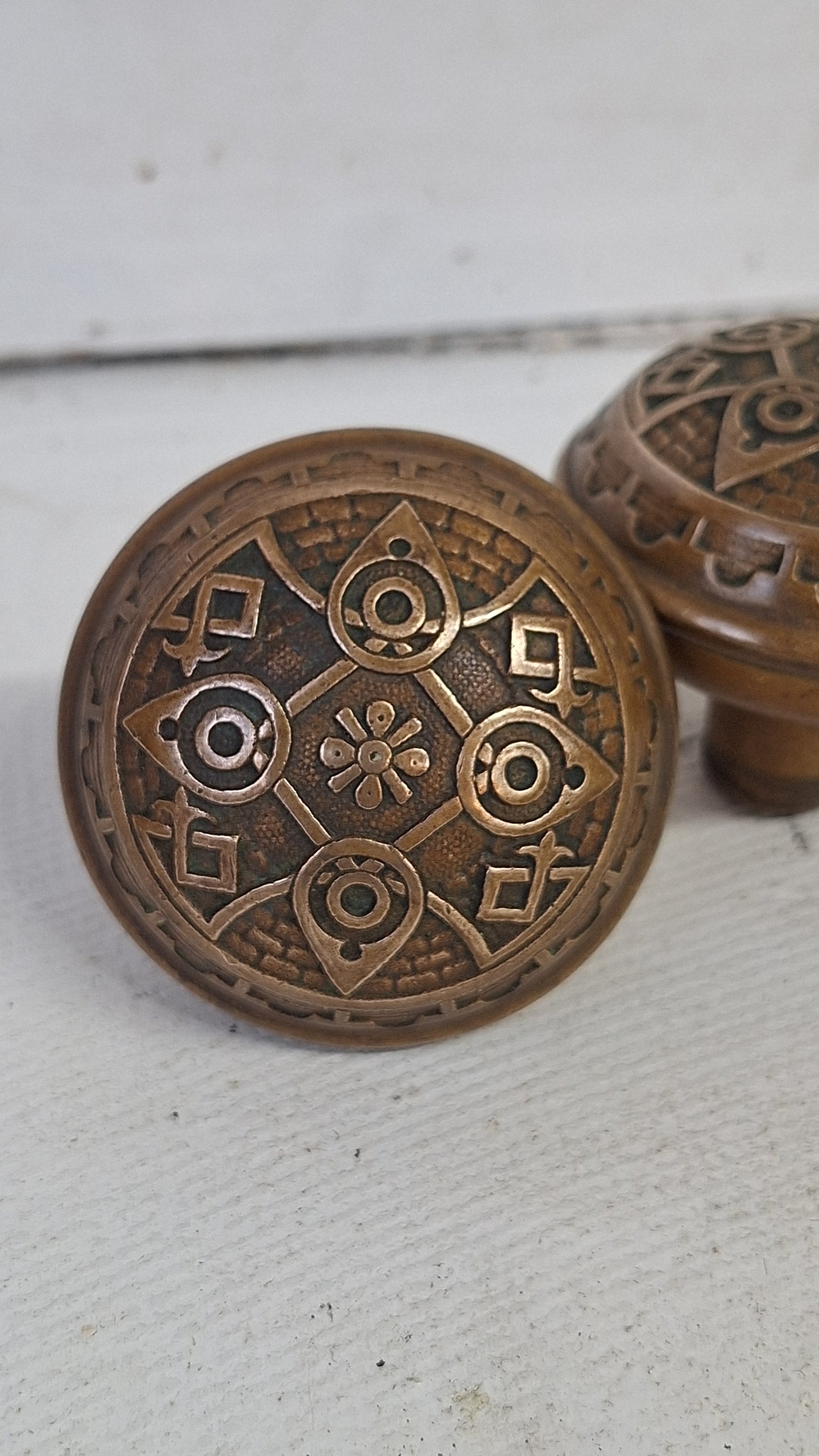 Pair of Wrought Bronze Norwalk Doorknobs, Two Ornate Bronze Doorknobs