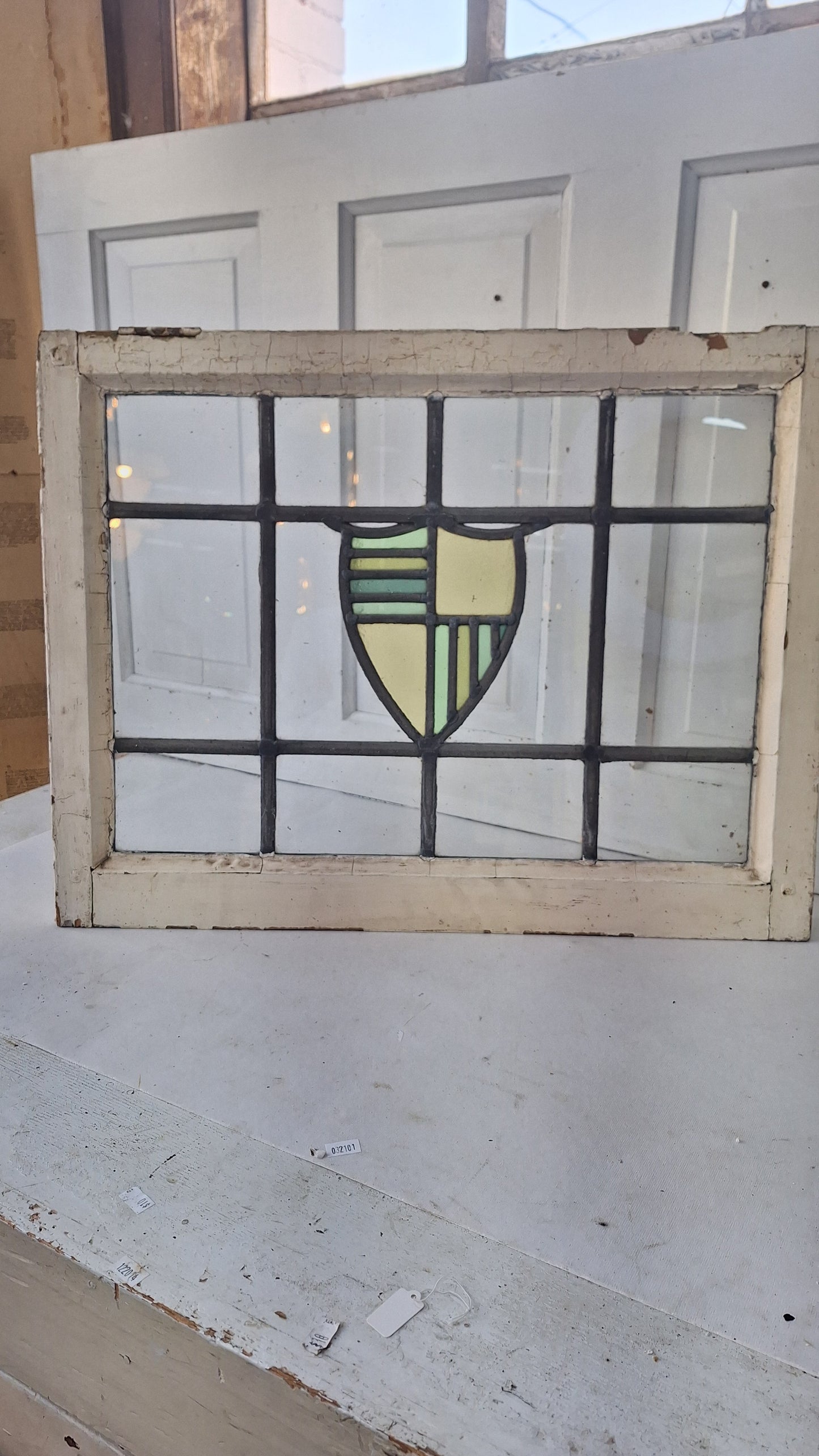 Antique Stained Glass Window: Yellow & Blue Shield Design