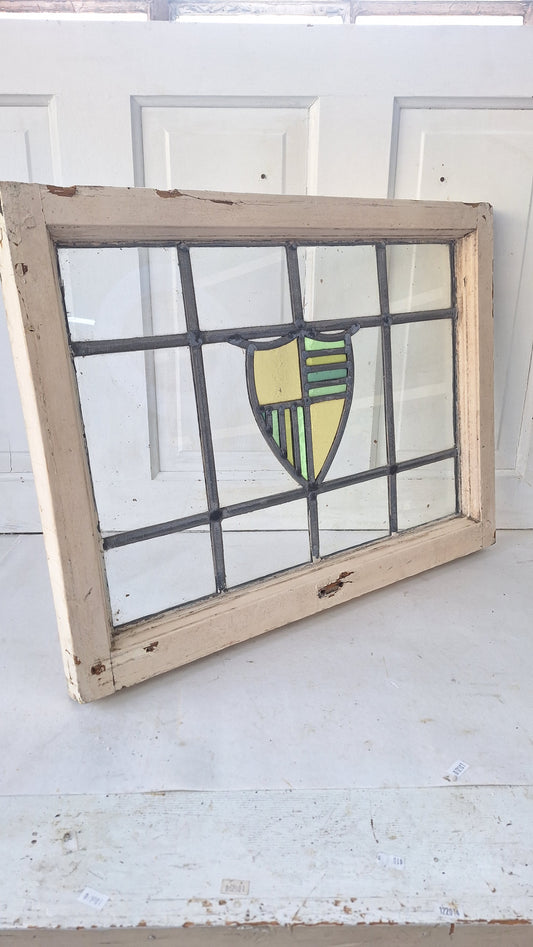 Antique Stained Glass Window: Yellow & Blue Shield Design
