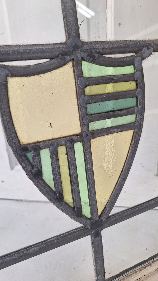 Antique Stained Glass Window: Yellow & Blue Shield Design