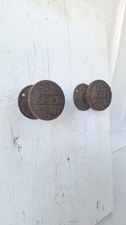 Pair Brass Banded Corbin Doorknobs with Rosettes