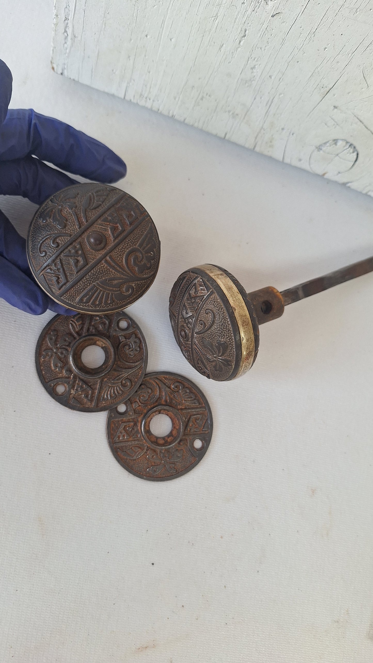 Pair Brass Banded Corbin Doorknobs with Rosettes