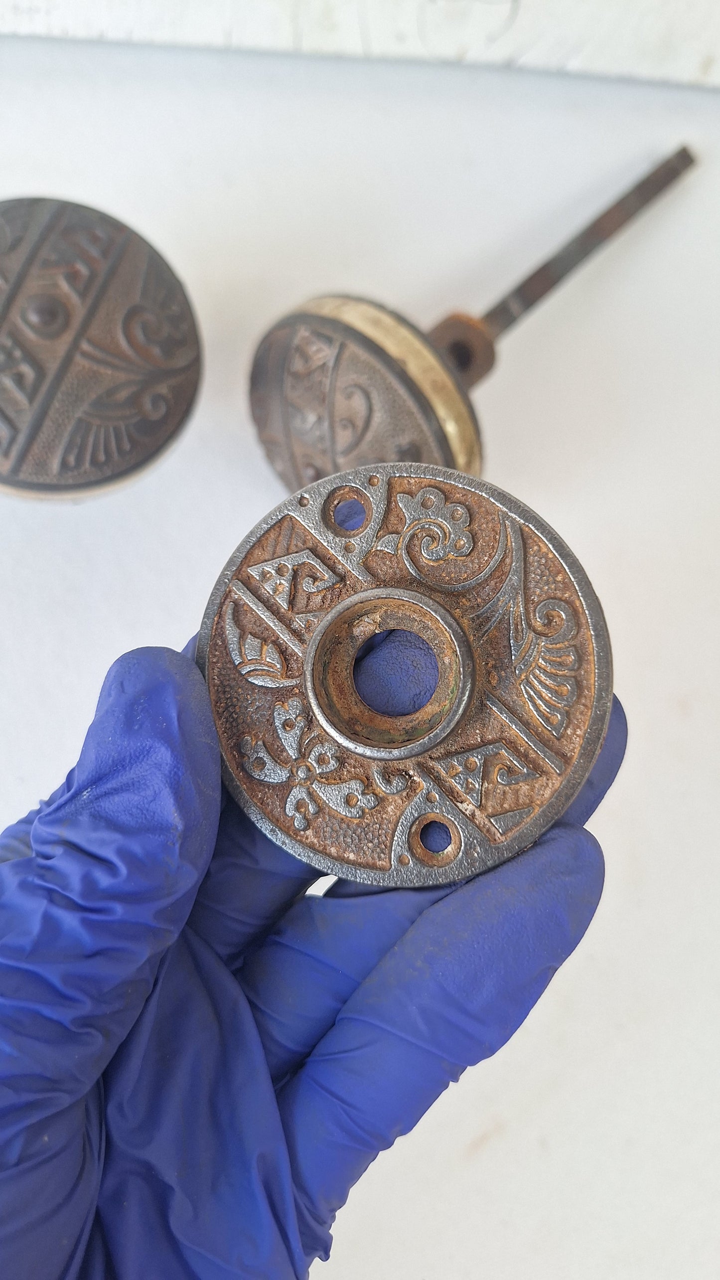 Pair Brass Banded Corbin Doorknobs with Rosettes