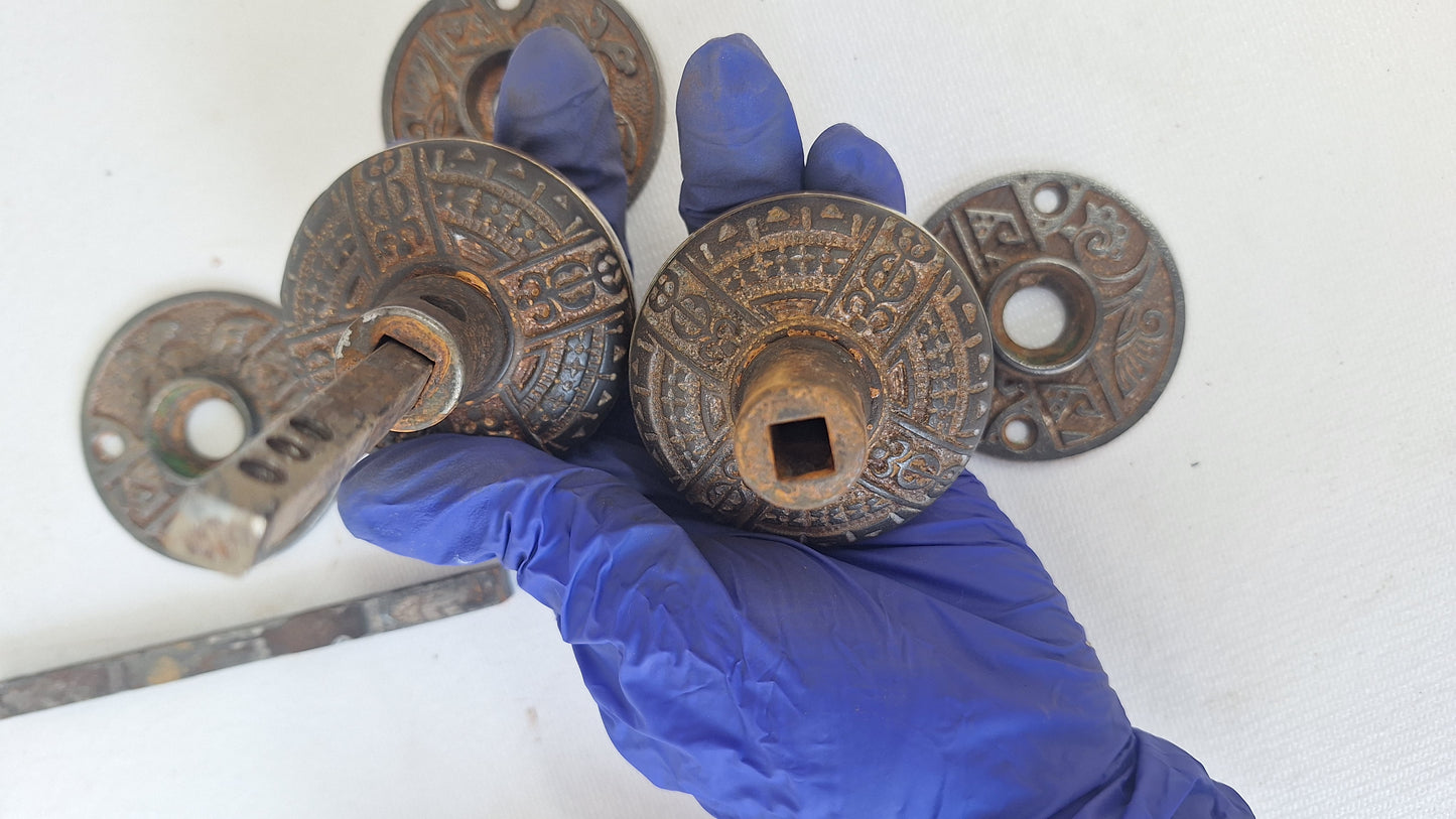 Pair Brass Banded Corbin Doorknobs with Rosettes