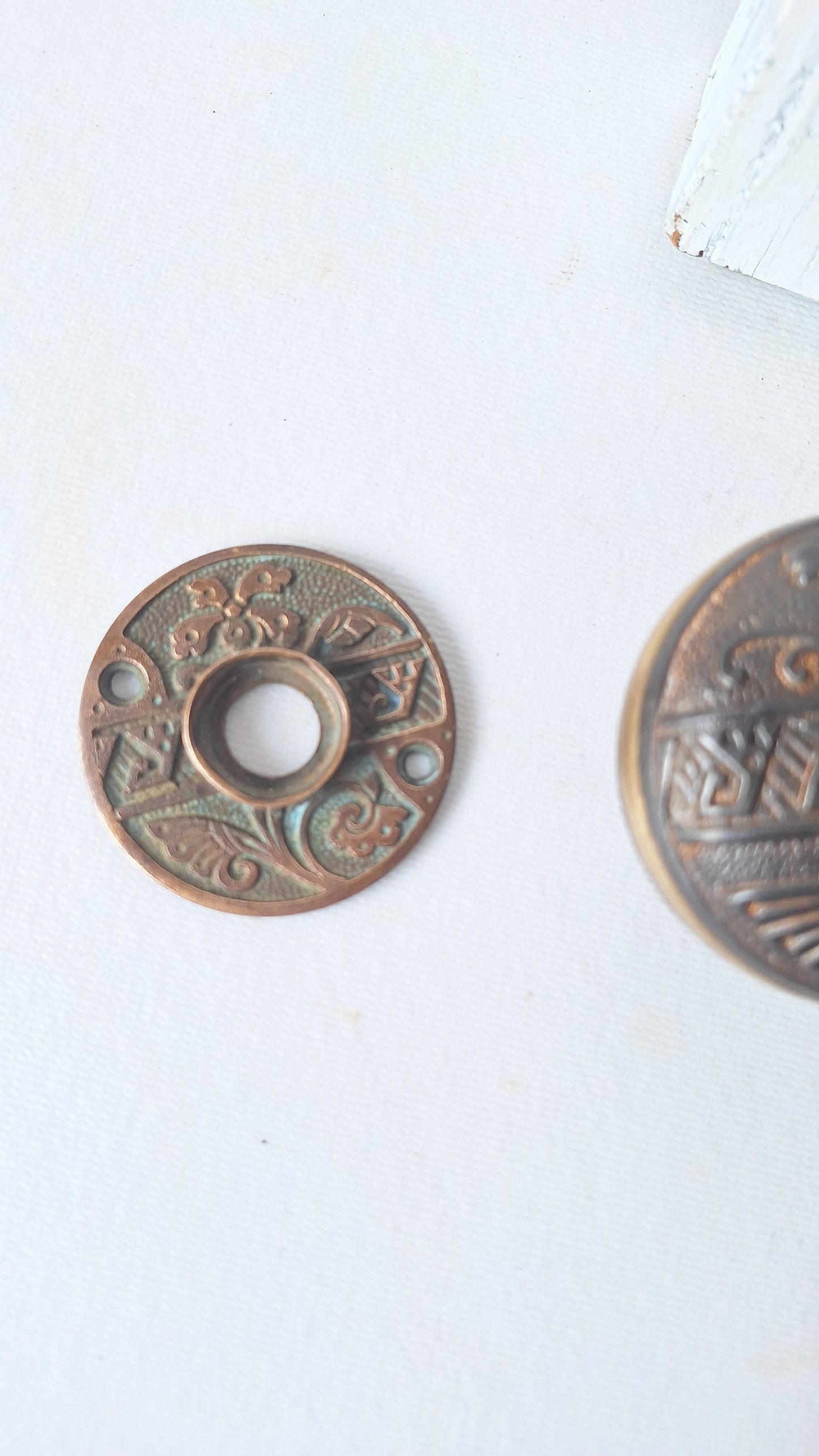 Pair Brass Banded Corbin Doorknobs with Bronze Rosettes