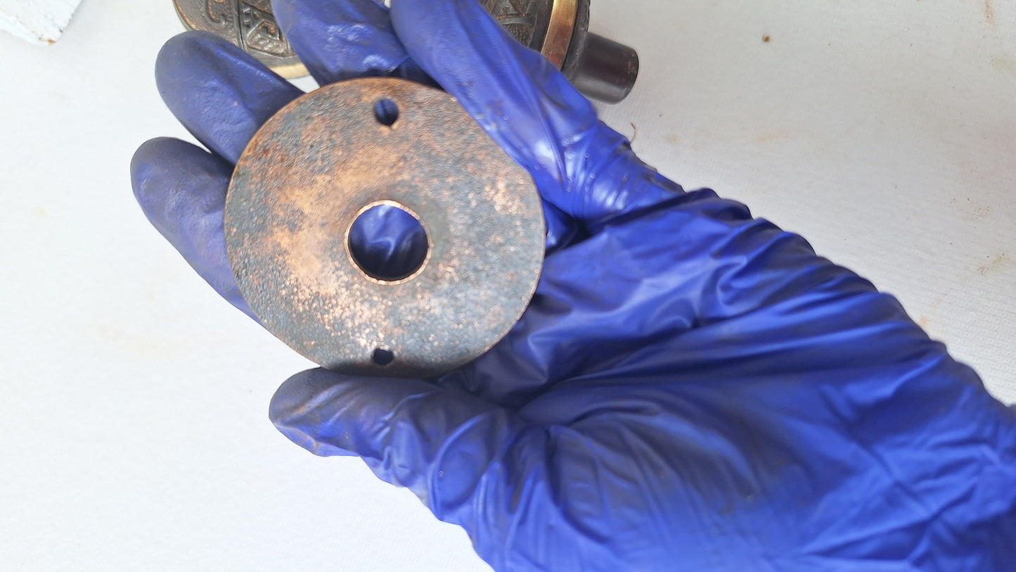 Pair Brass Banded Corbin Doorknobs with Bronze Rosettes
